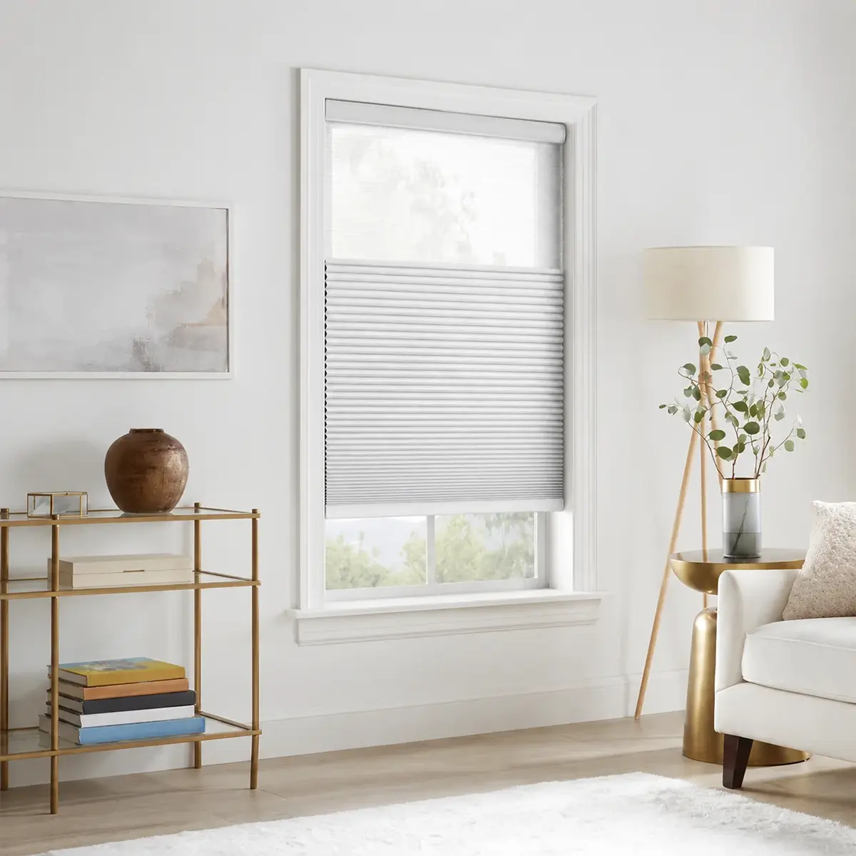Day and night cellular shades in a bedroom